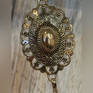 Elegant Gold Concho Belt.  49”